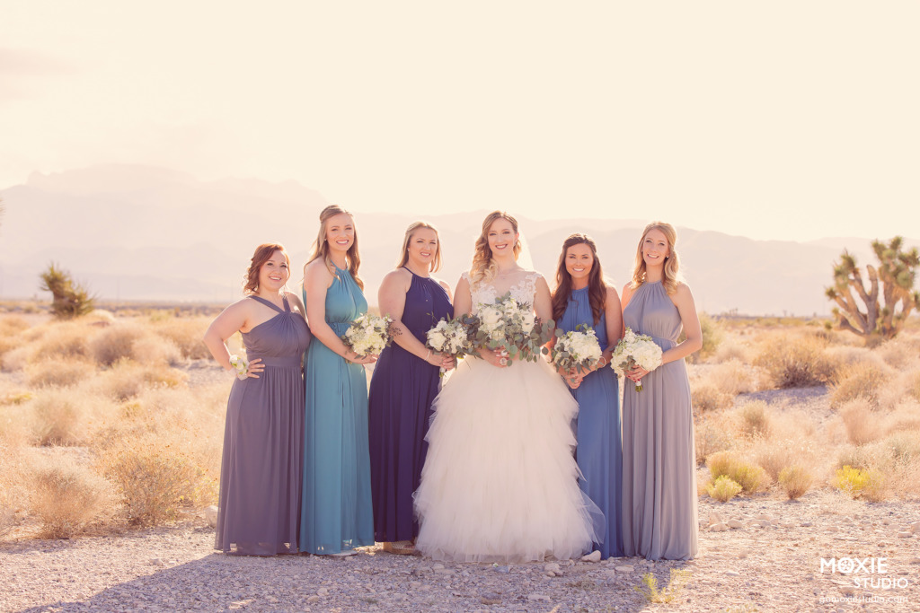 bride and her bridesmaids in blue dresses at the Las Vegas Paiute Golf Resort