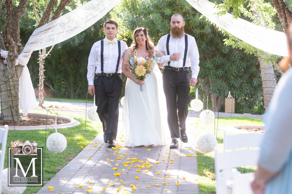 Bride Walks with Brothers