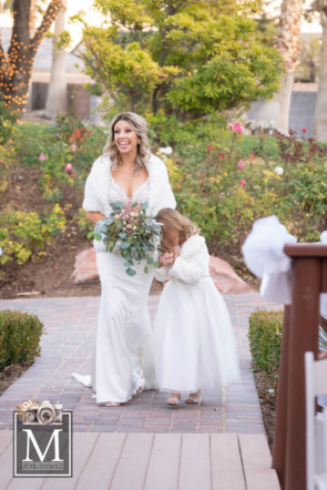 Bride walks with her daughter