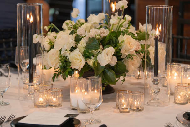 White floral centerpieces at a intimate wedding at the Lotus House.