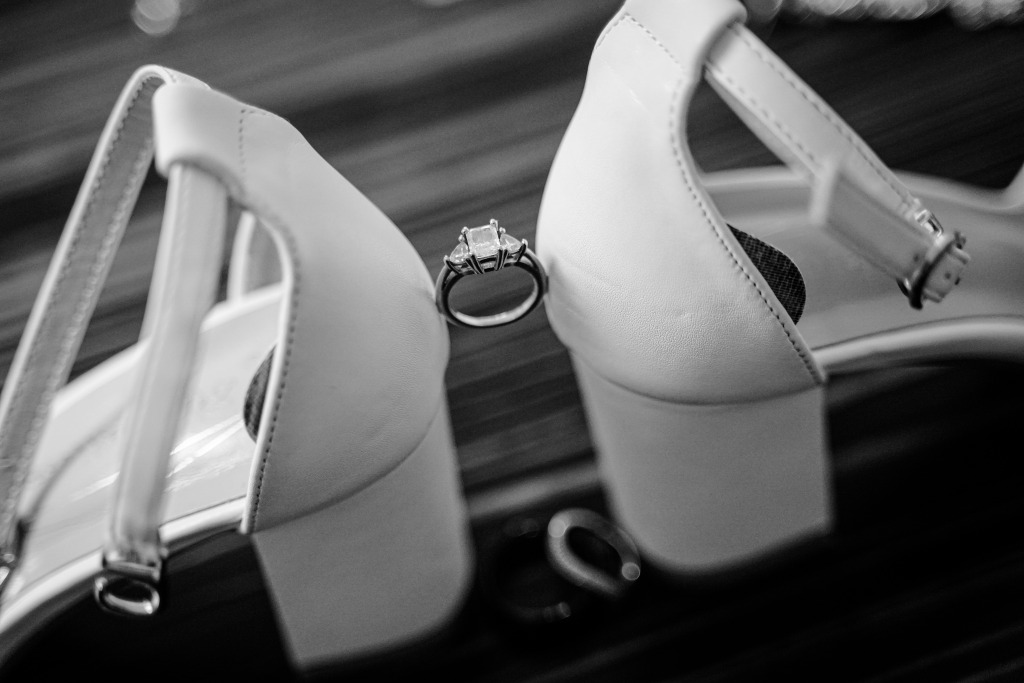 Las Vegas photographer captures photo of the ring balanced between the bride's shoes.