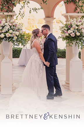 Brettney and Kenshin's luxurious Las Vegas wedding showcased stunning white florals at their romantic outdoor ceremony.